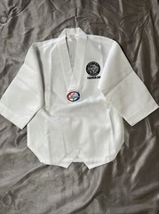 TIGER KIM’S V-NECK MARTIAL ARTS UNIFORM SIZE 000. G