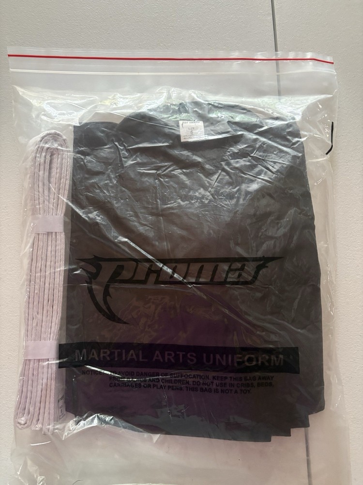 Brand New PROMA Martial Arts Gi size 5 with White Belt