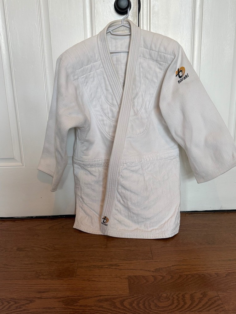 Toraki Judo Gi top size 3.5. Extra thick like armor. Double weave white belt