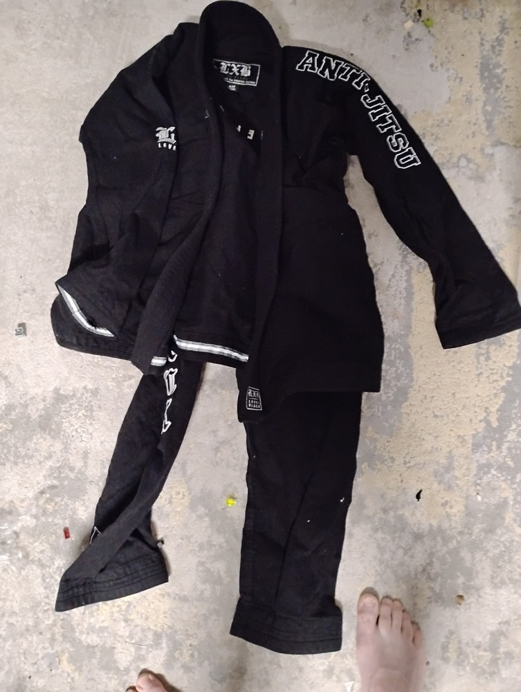 level x black gi