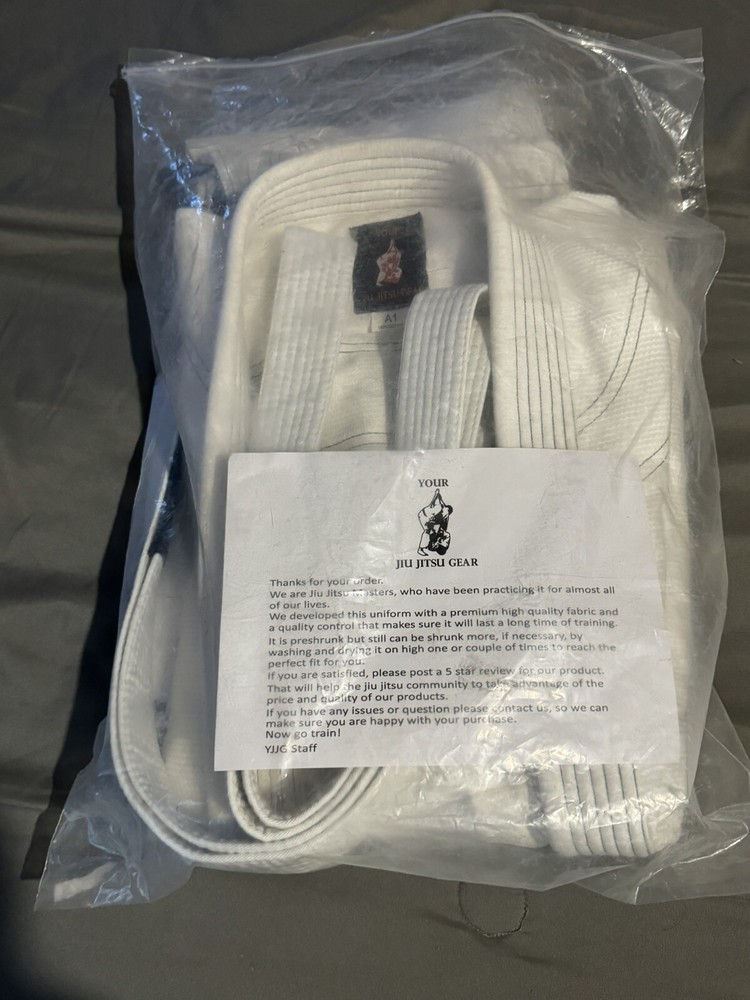 Jiu Jitsu premium white fight gear w/ top, bottoms, & white belt. New, size A1