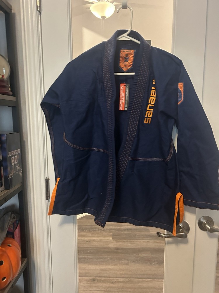 Sanabul K1 Kids Jacket Navy Blue Orange Trim Brazilian Jiu Jitsu Martial