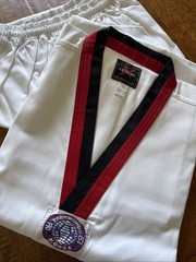 Size 5 (190) White taekwondo uniform with Red/black trimmed
