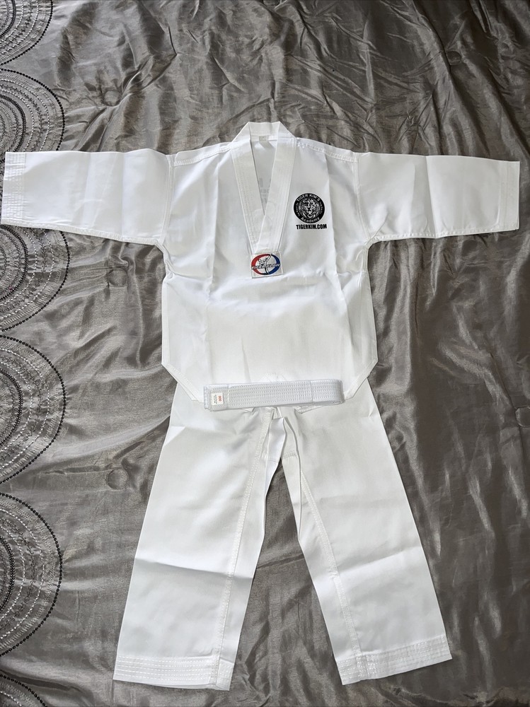 TIGER KIM’S V-NECK MARTIAL ARTS UNIFORM SIZE 000. G