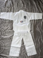 TIGER KIM’S V-NECK MARTIAL ARTS UNIFORM SIZE 000. G
