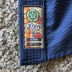 Flow Jiu-Jitsu Gi Blue with Multicolor Accents Orange Red White