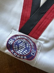 Size 5 (190) White taekwondo uniform with Red/black trimmed