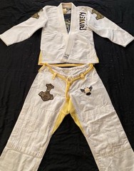 Raven Fightwear Women’s Size F2 White Yellow BJJ Gi with Thor VS Jörmungandr